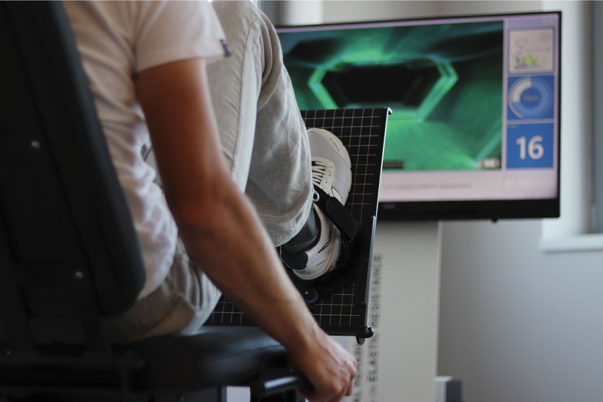 Patient exercising with a VAST.Rehab virtual reality station